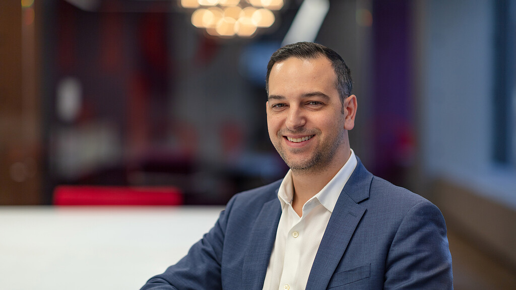 A man smiling for the camera.